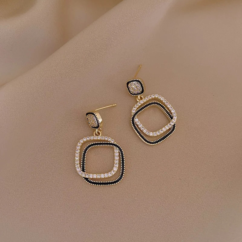 Жіночі сережки гвоздики 35 на 20 мм золотисто-чорний Київ - фото 4