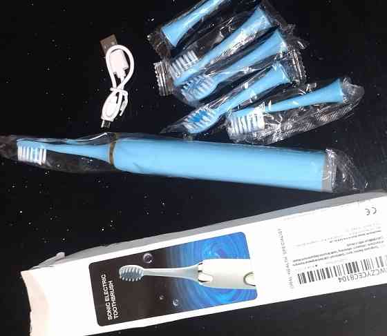 Электрическая зубная щётка + 6 насадок . Харьков
