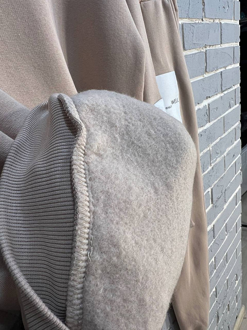 Костюм жіночий ENJOY 2920 худі з капюшоном брюки резинка нашивка утеплений фліс бежевий, бежевий, S Київ - фото 13