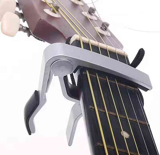 Гитарный каподастр для шестиструнной гитары капо 9 см серый Киев
