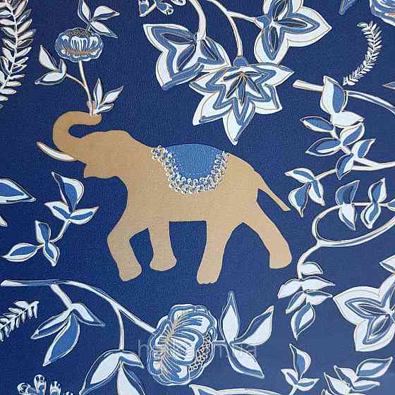 Шпалери вінілові на флізелін Caselio Mystery 0.53х10 м дитячі яскраві блакитні квіти білі слони золотом на Київ