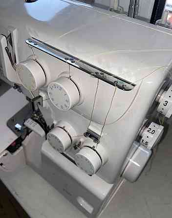 Новый Качественный Оверлок на 4 нити качестенный брендовый настроен. Харьков