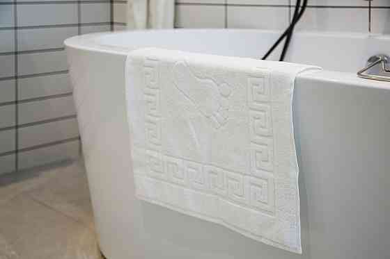 Ecotton Килимок махровий Ecotton 50х70 см 650 гр./м рушник для ніг білий з тисненням Ніжки для Киев