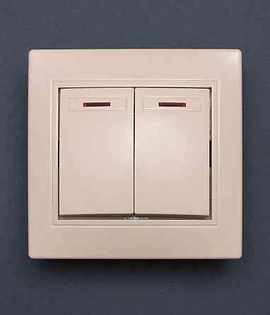 Вимикач 2-клавішний з підсвіткою крем Valeso BK-2002 Київ