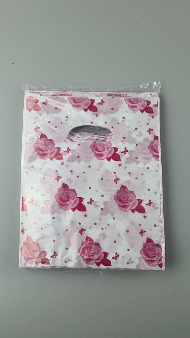 Пакети з вирубаною ручкою (20*25) "Рожечки" Комсерв (100 шт.) Харків - фото 1