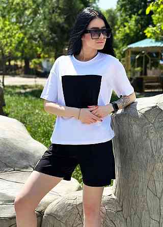 Двокольоровий костюм з шортами "Numb" оптом | Норма | Розпродаж моделі Чорний, 42-44 Київ