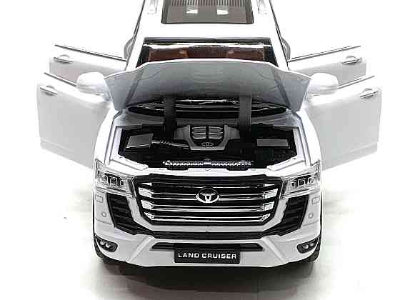 Машина Автосвіт Toyota Land Cruiser 30 інерційна відчиняються двері капот багажник 20см Білий (AP-2033) Чернігів