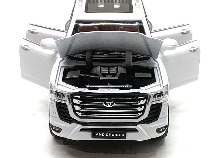 Машина Автосвіт Toyota Land Cruiser 30 інерційна відчиняються двері капот багажник 20см Білий (AP-2033) Чернігів - фото 6