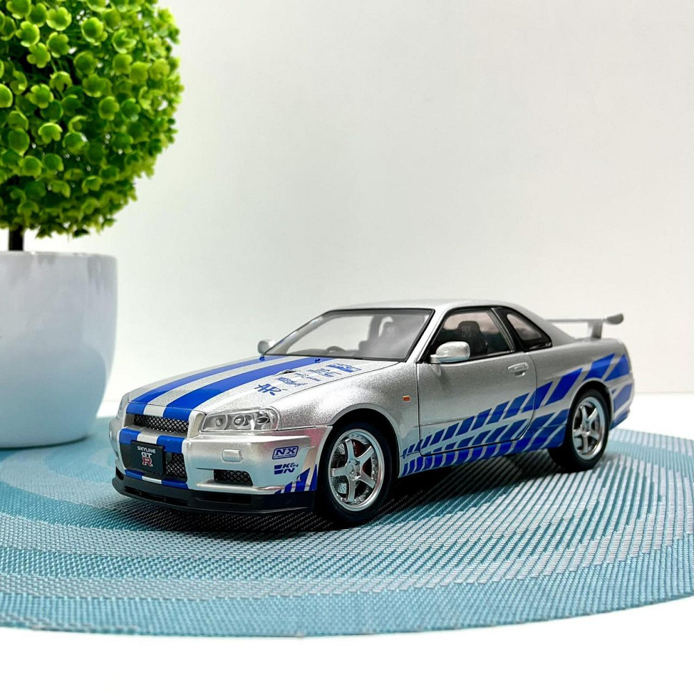 Машинка металева Авто Експерт Nissan GT-R 1:24 світло/звук відчиняються двері капот багажник Сіра (1990-21) Чернигов - изображение 1