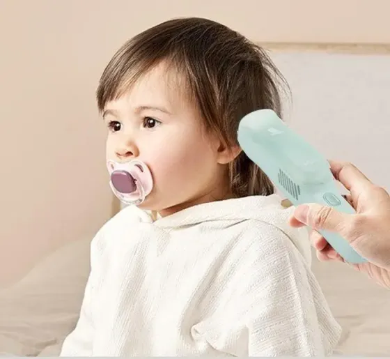 Машинка для стрижки детей бесшумная с вытяжкой VGR V-155, 4 безопасные насадки, IPX8, зеленая Коломыя