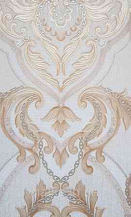 Шпалери вінілові на флізеліні AdaWall Seyyah 1.06х10 вензелю завитки великі структурні золотом на бежевому Київ