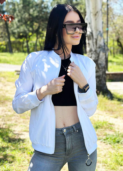 Жіноча вітровка з щільної плащівки "Leland" оптом | Розпродаж моделі Білий, 42-44 Київ - фото 4