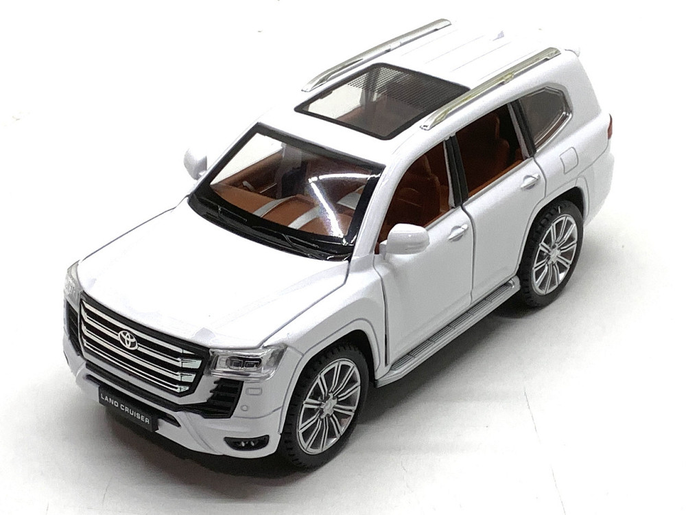 Машина Автосвіт Toyota Land Cruiser 30 інерційна відчиняються двері капот багажник 20см Білий (AP-2033) Чернігів - фото 1