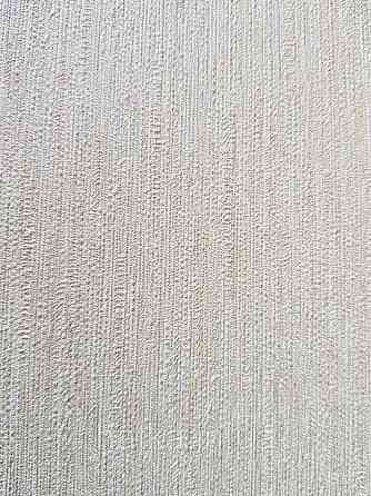 Шпалери вінілові Decoprint Breeze 0.53х10 м однотонні структурні тонка смужка під тканину жовті Київ