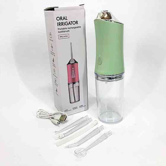 Іригатор для чищення зубів та порожнини рота Oral Irrigator з акумулятором та змінними насадками. YL-394 Колір: зелений Київ