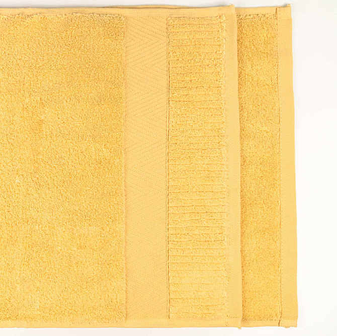 Махровий рушник 50x90см Преміум якості Зеро Твіст Бордюр 550г/м2 (Жовтий) Суми - фото 3