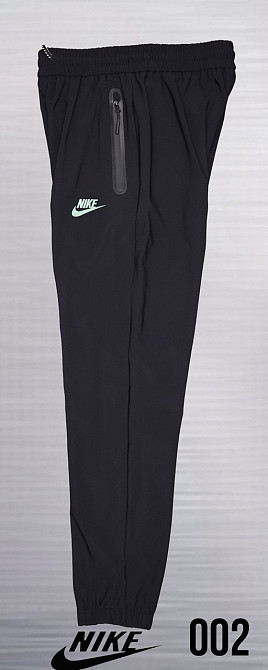 Чоловічі завужені штани під євроманжет Nike,тканина лакоста new Tech knit Суми - фото 4