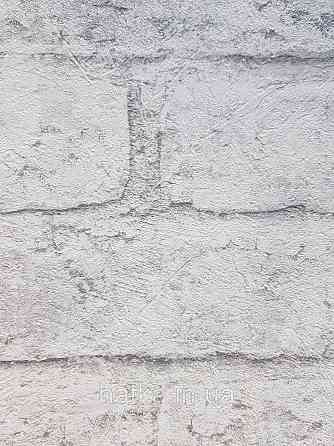 Шпалери вінілові на флізеліні Grandeco Anastasia метрові під цеглу структурні білі сірі Київ