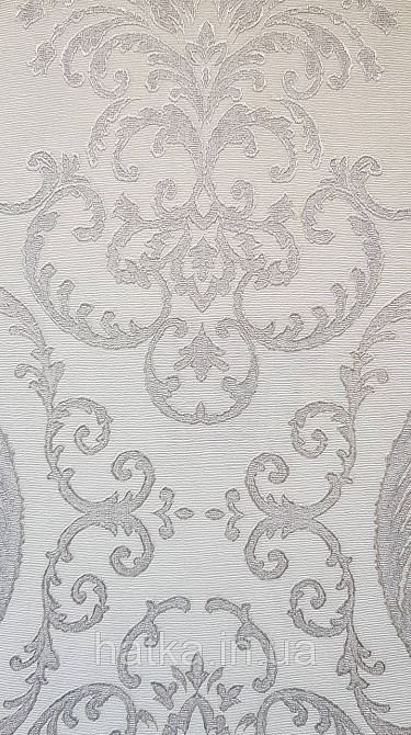 Шпалери вінілові на флізеліні AdaWall Seyyah 1.06х10 завитки вензеля великі структурні сріблясті на білому Київ - фото 1