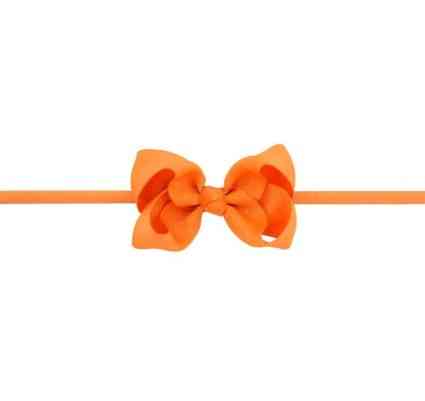 Дитяча повязочка на голову помаранчева - розмір універсальний (на резинці), бантик 8см Київ
