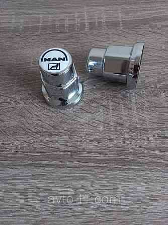 Ковпачок пластиковий на гайку 32мм MAN нікель Ковпачок пластиковий 32мм MAN Луцьк