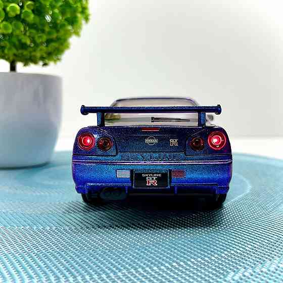 Машинка металева Авто Експерт Nissan GT-R 1:24 світло/звук відчиняються двері капот багажник Фіолетова (1990-21) Чернігів