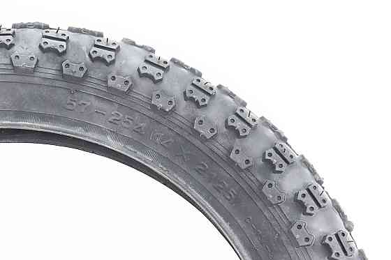 Шина 14"x2,125 (57-254) шипована C714 Київ