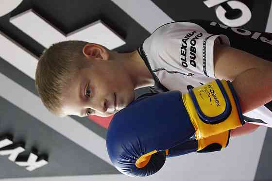 Боксерські рукавиці PowerPlay 3004 JR Classic Синьо-Жовті 6 унцій Луцьк