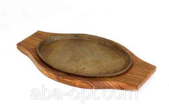 Пательня чавунна овальна на дерев'яній підставці 24 х 14 см (шт) Одеса