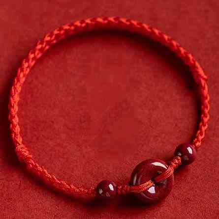Красный браслет из киновари на плетеном шнурке – талисман удачи и защиты Киев