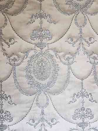 Шпалери вінілові на флізеліні Rasch Trianon Xlll 0.53х10 класика структурні вензелю розетки срібло на бежевому Київ