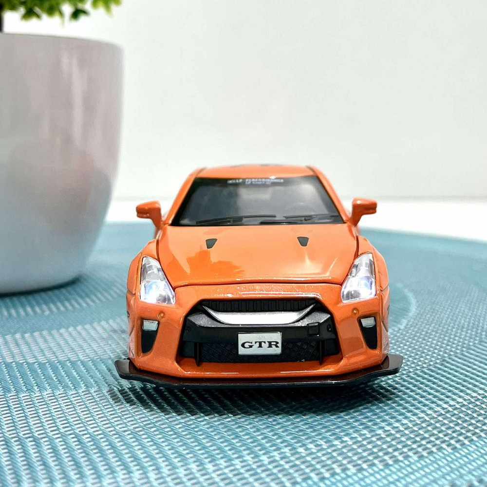 Машинка Auto Expert Nissan GTR металева 1:32 світло/звук/інерційна Жовтогаряча (38071) Чернигов - изображение 6