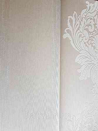 Текстильні шпалери на флізеліновій основі Cador Rasch Textil 086033 однотон молочний бежевий Київ