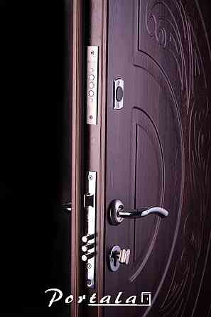 Двери уличные, серия Элегант, модель Рассвет, гнутый профиль, 2 контура уплотнения, 2 замка 850 Киев