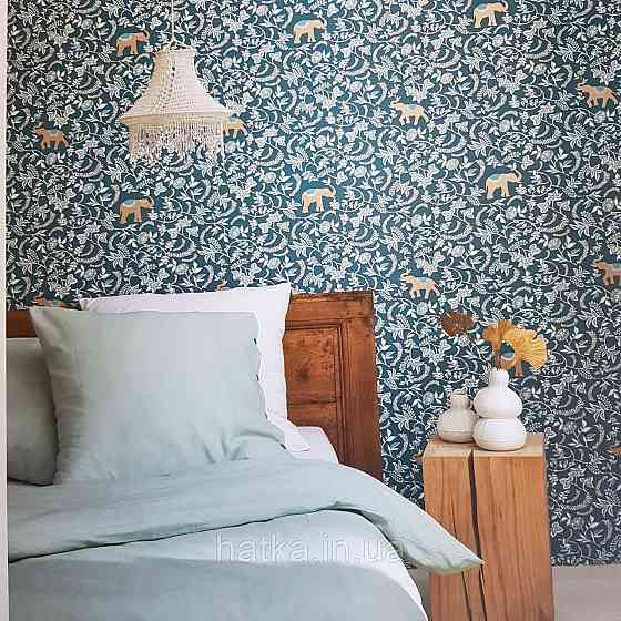 Шпалери вінілові на флізелін Caselio Mystery 0.53х10 м дитячі яскраві квіти білі зелені слони золотом на Київ