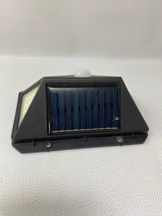 Светильник с датчиком движения на улице на солнечном аккумуляторе solar interaction wall lamp Б/У Киев