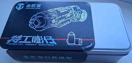 Новинка!Металлический стреляющий пистолет-спиннер-антистресс. Харьков