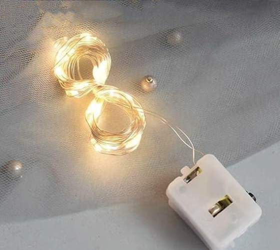 Світлодіодна гірлянда на батарейках X-mas 3м (Теплий жовтий): нитка-роса, 3хLR44 у комплекті, декор Одеса