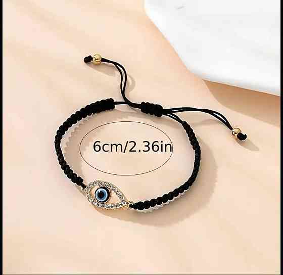 Браслет на чёрном шнурке с подвеской глаз Киев