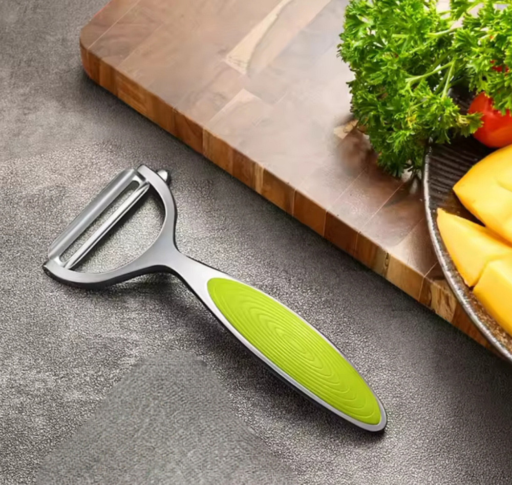 Овощечистка универсальная с нержавеющей стали 15 на 6,5 см салатовый Киев - изображение 1