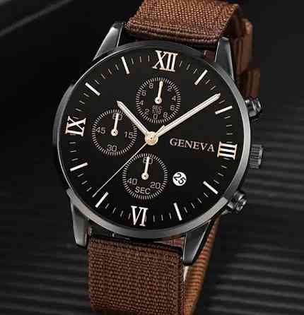 Подарочный набор для мужчин: наручные часы с 3 ориг. браслетами- диам 4см, длин 24см, шир рем 2см, без коробки Киев