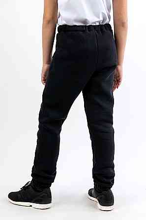 Детские теплые штаны с начесом, черные топ Юрма одяг 128 Киев