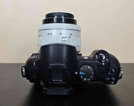 Бездзеркальний фотоапарат Samsung NX10 + об'єктивом 20-50 мм Клевань
