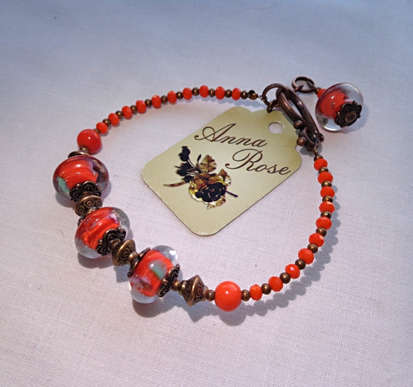 Браслет на руку ручной работы  оранжевый  