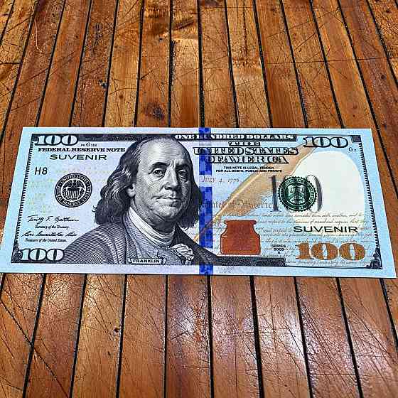 Доллары купюры по $100 нов. дизайна (синие), сувенир, игровые, пачка/80 банкнот Киев