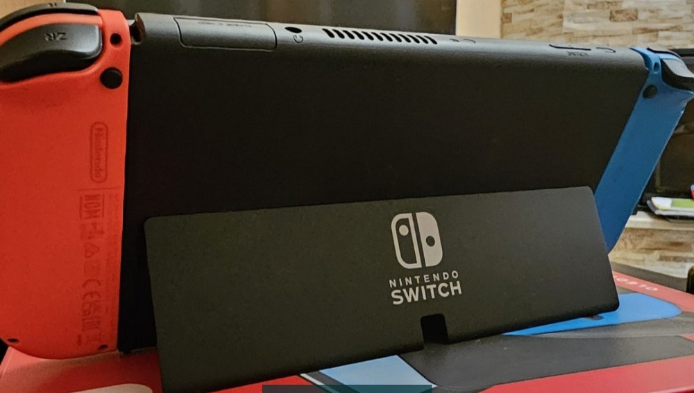 Приставка Nintendo Switch OLED (Neon Blue and Neon Red) Київ - фото 5