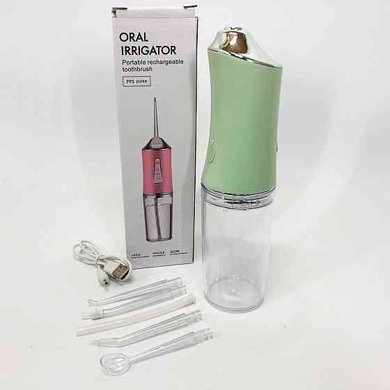 Іригатор для чищення зубів та порожнини рота Oral Irrigator з акумулятором та змінними насадками. YL-394 Колір: зелений Київ