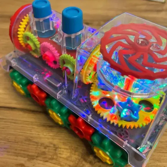 Детский интерактивный прозрачный поезд со светом, музыкой и поворотом на 360° Коломия