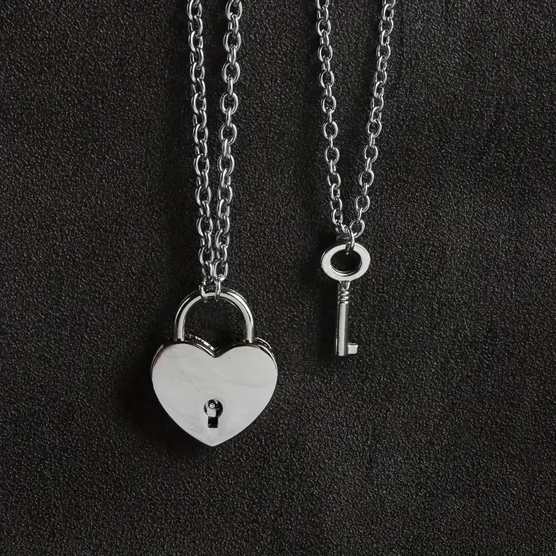 Парні підвіски “Серце-замок і ключ” — нержавіюча сталь (набір 2 кулонів) Київ - фото 1