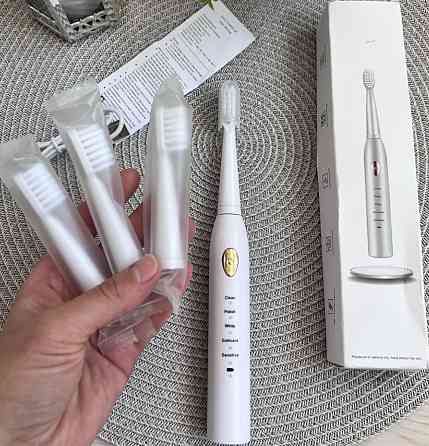 Электрическая зубная щетка. Киев